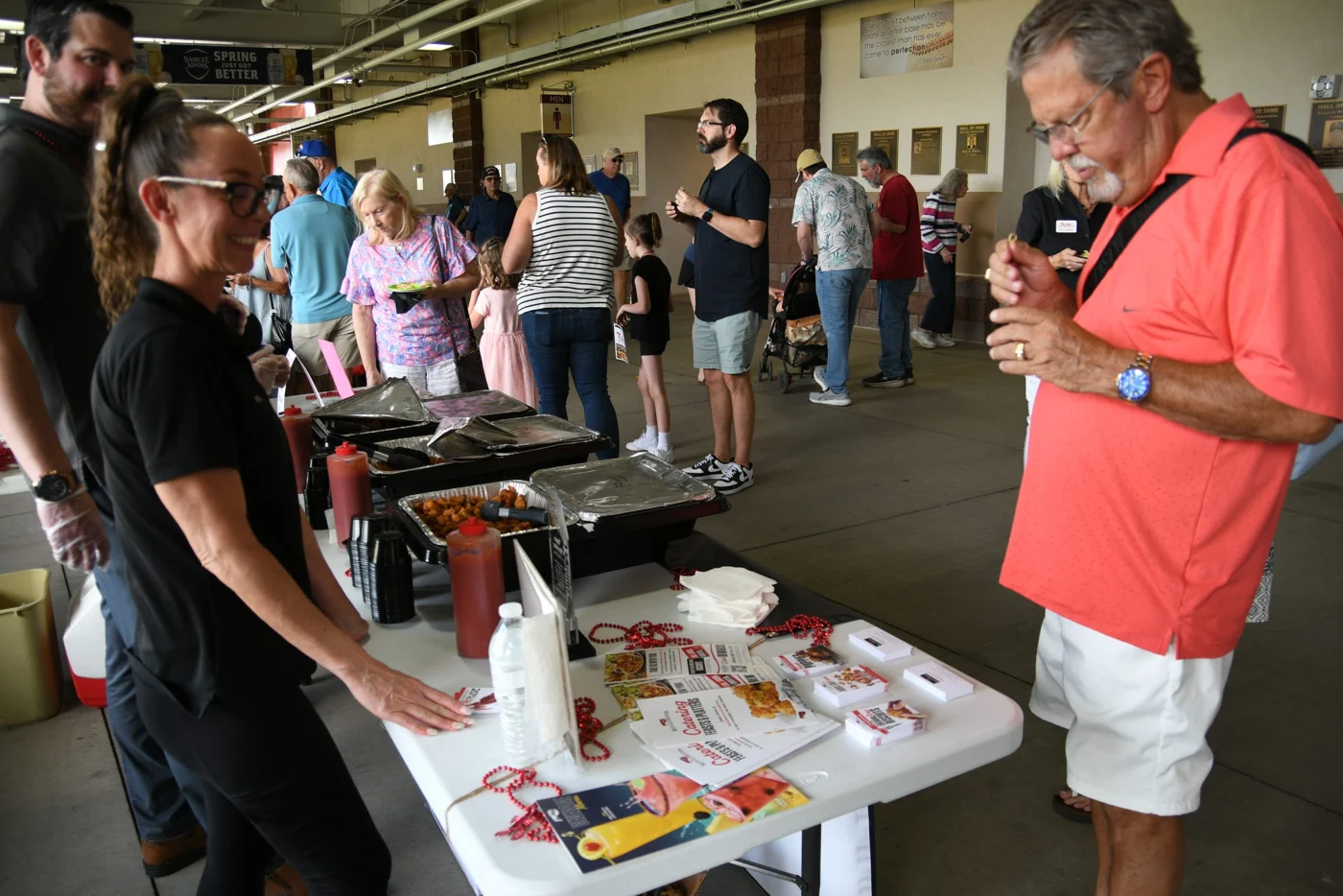 Guests exploring local artwork at a past festival